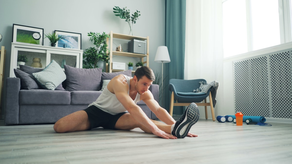 Man performing flexibility stretching exercise